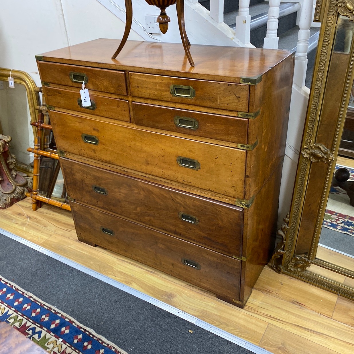 A Victorian brass bound mahogany two part military chest fitted four short and three graduated long drawers width 107cm, depth 45cm, height 109cm.